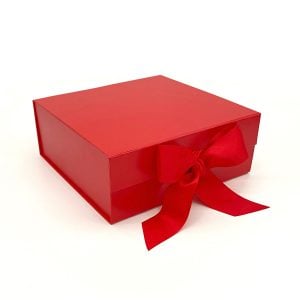 red gift box with red bow for Sip! Extraordinary Drinking Chocolate holiday gift set